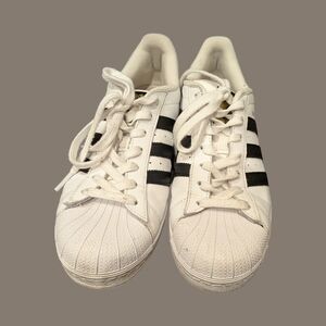 White Sneakers with Black Stripes
